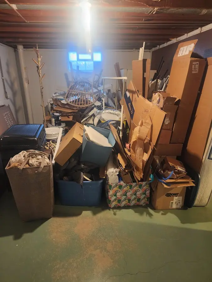 Roll-off dumpster container at job site for 2 Yard Dumpster Rental in White Pigeon